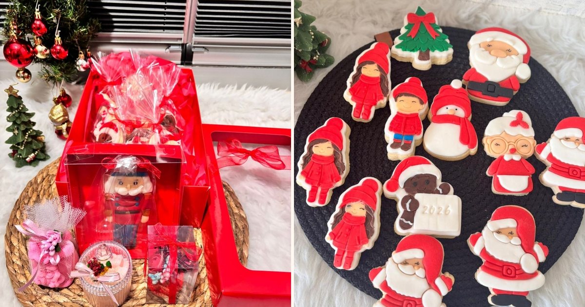 Kurabiye, mum ve süs içeren yılbaşı hediye kutusu ve karışık yeni yıl kurabiyeleri
